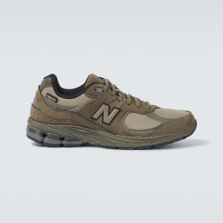 designer di moda New Balance Scarpe 2002R con bordo in pelle scamosciata di colore verde